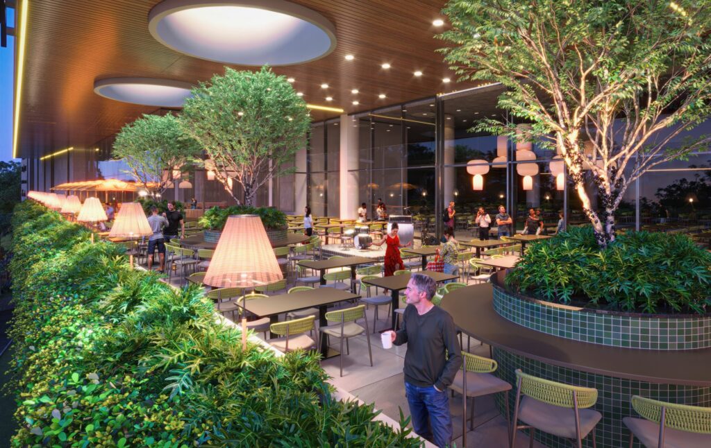 Área externa de restaurante com mesas modernas, iluminação suave e plantas, integrando arquitetura e tecnologia para um ambiente aconchegante.